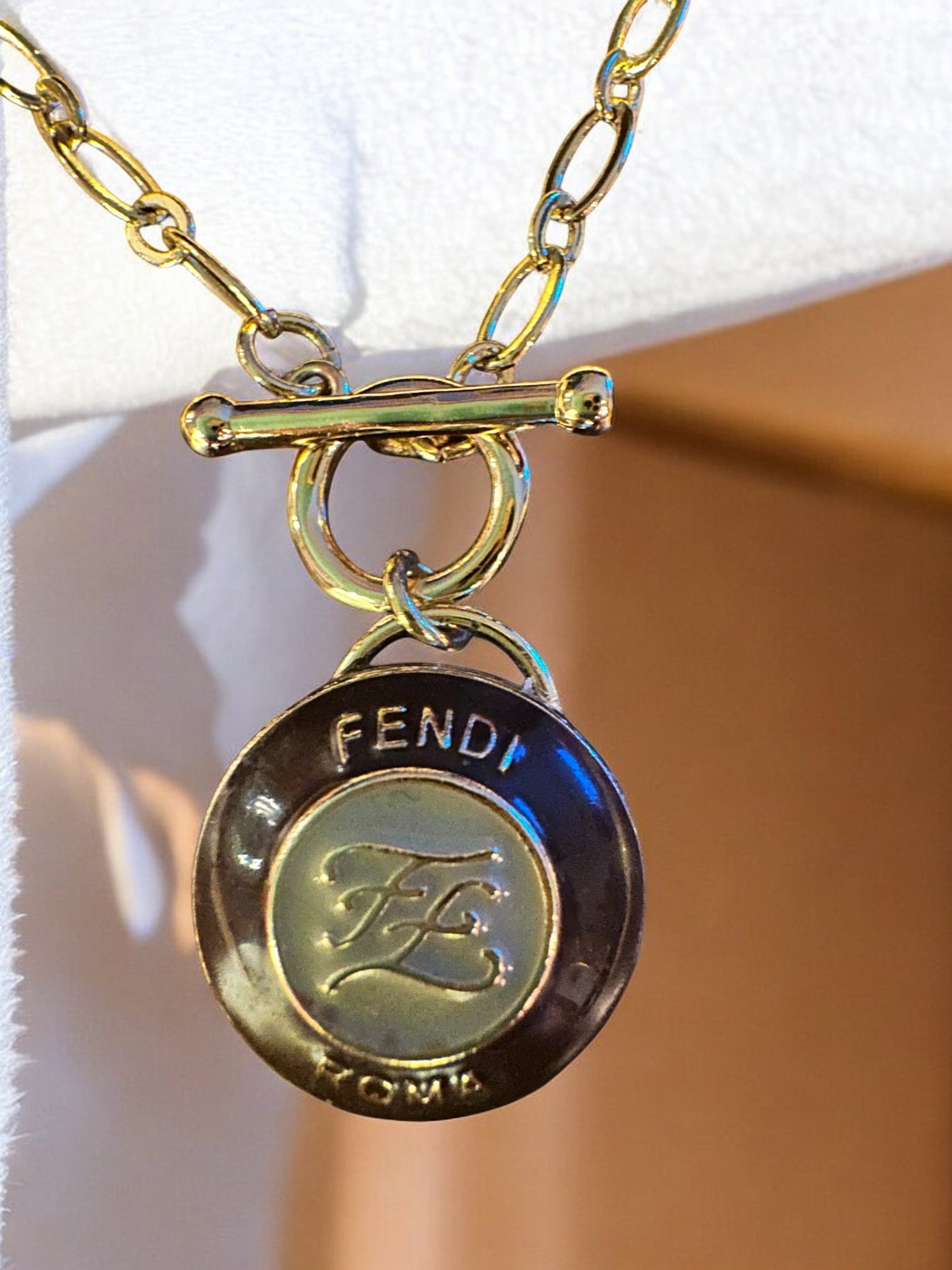 Luxury Designer Deep Brown Fendi Button Necklace with Gold Filled Chain